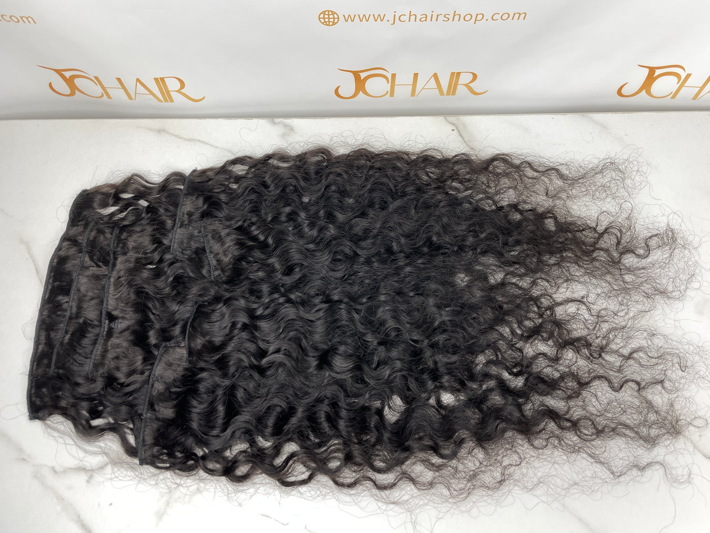 Top Virgin Classic Clip in Extension #1B - Burmese Curly